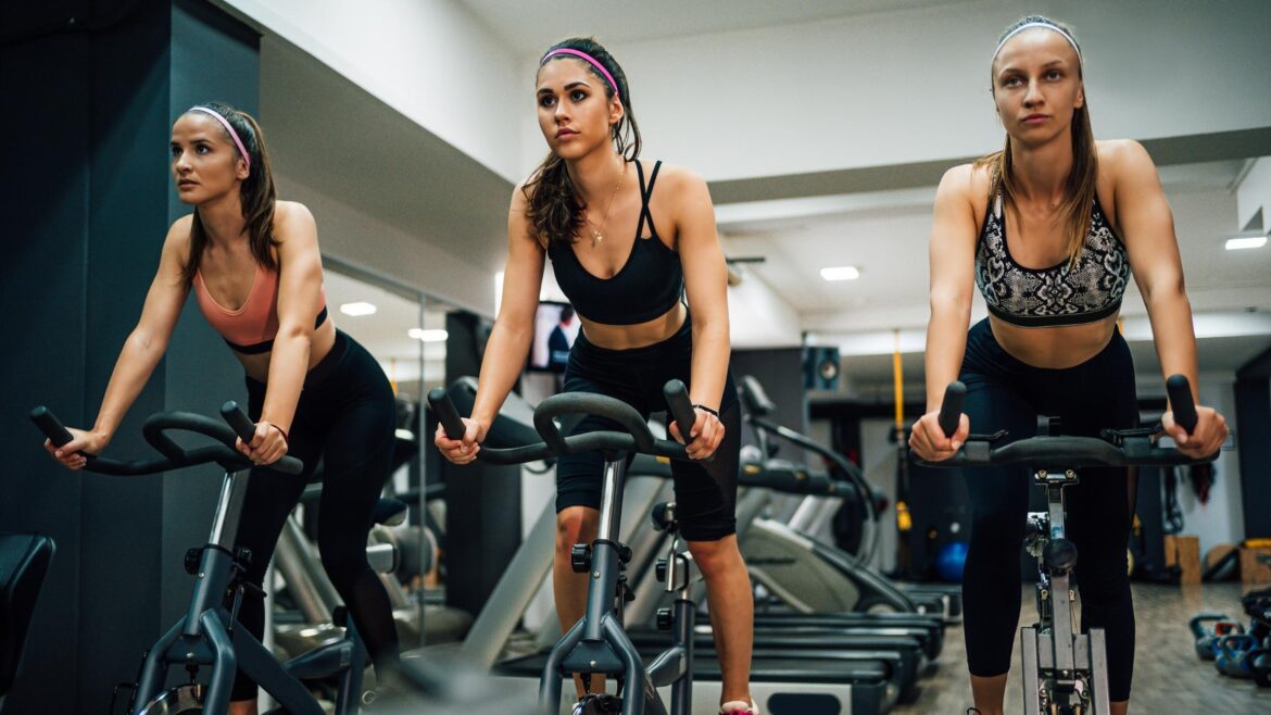 Women doing gentle cardio using cycling fitness